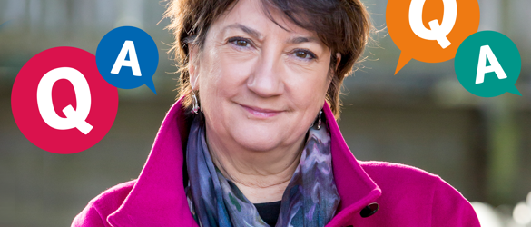 Cathy surrounded by 'Q' and 'A' graphics 