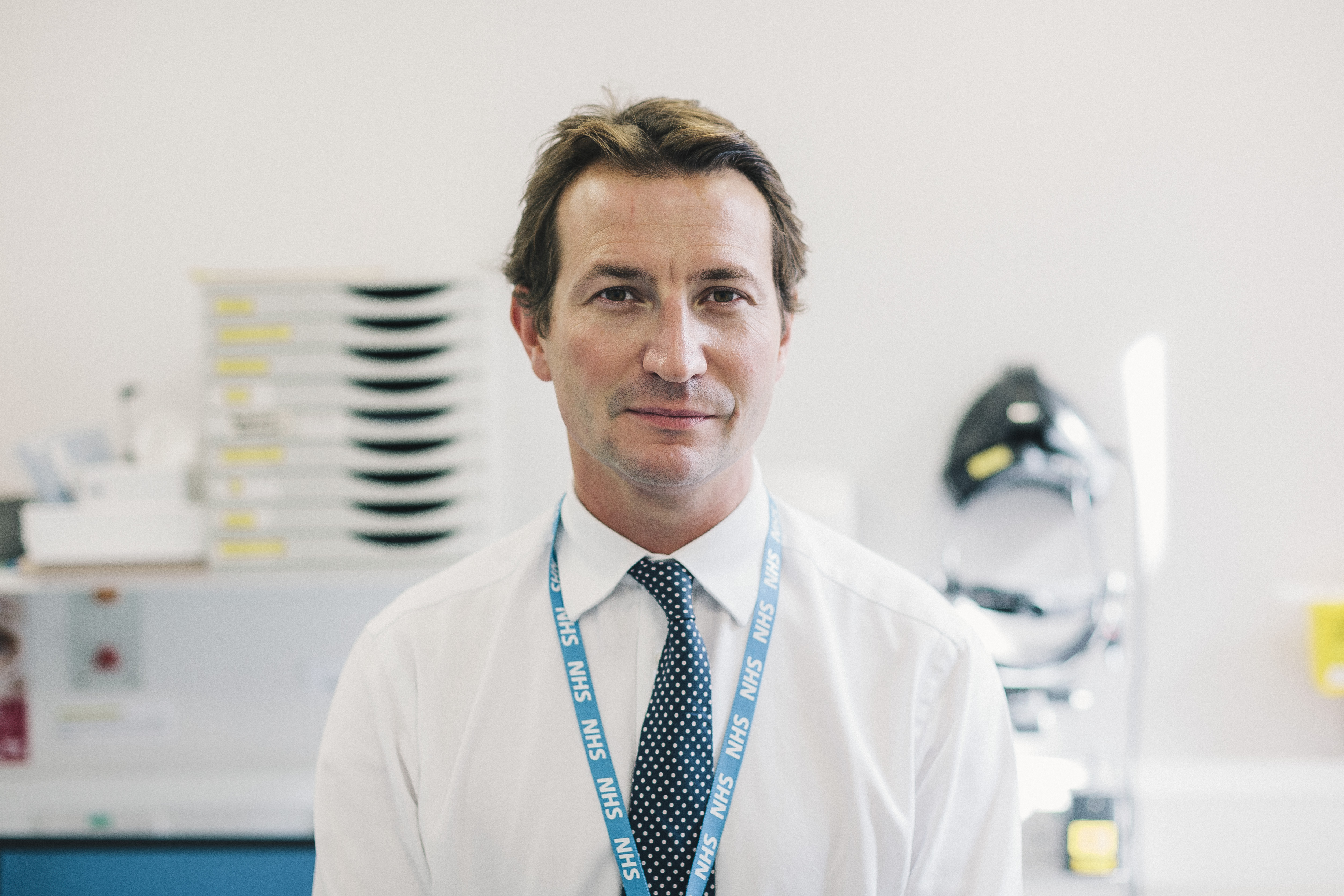 Male consultant in laboratory.