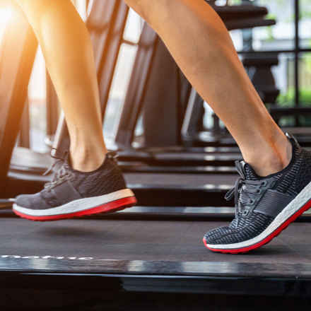closeup of legs on treadmill