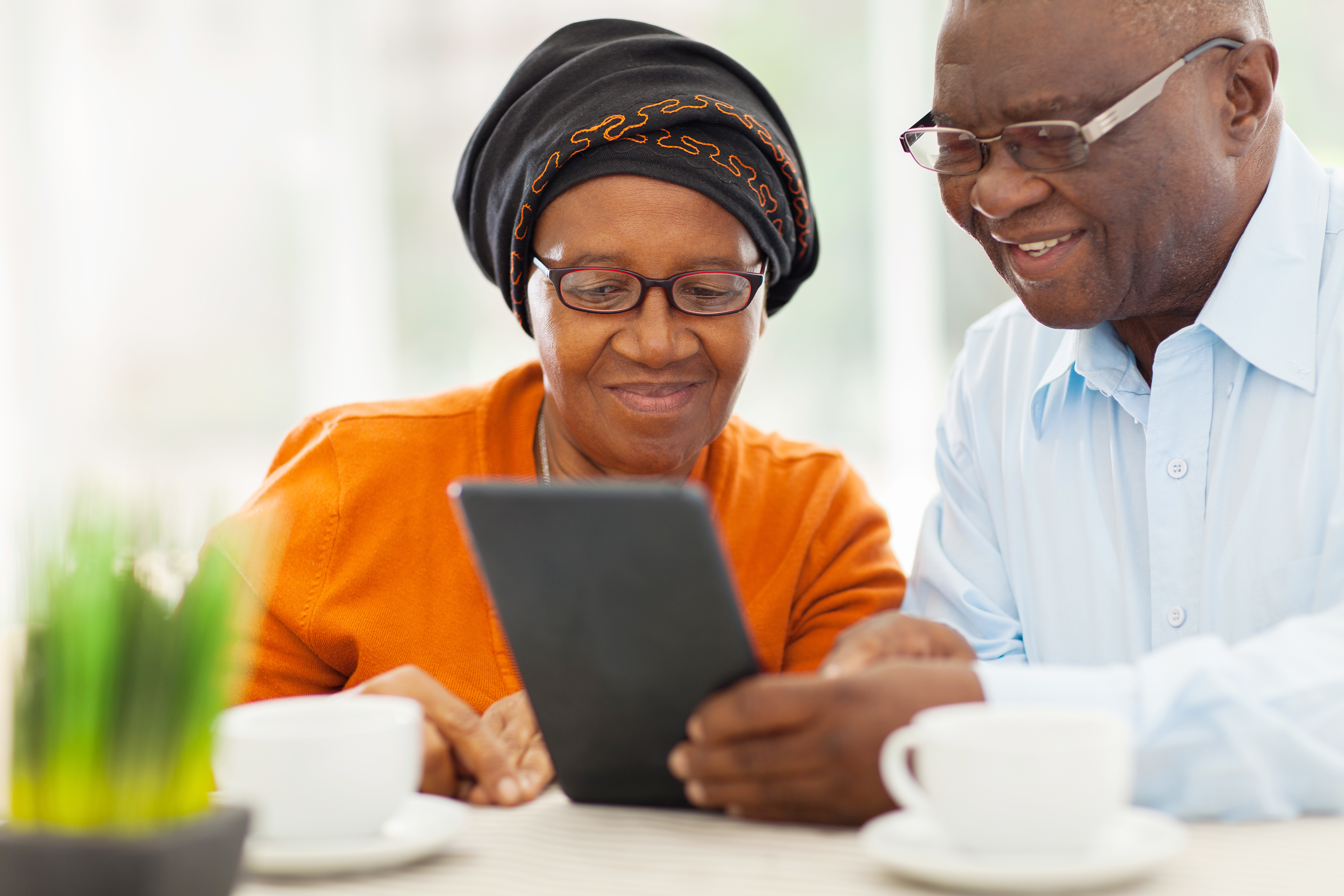 Couple looking at tablet