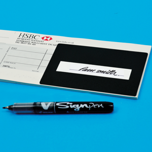 Macular Society signatory guide example use on signed bank cheque with pen